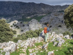 Hiking woman, mountain range Sierra de Grazalema, Parque natural de la Sierra de Grazalema,