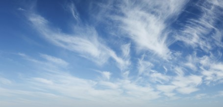 Clear Blue Sky with Whispy White Clouds - Perfect for Nature and Weather Backgrounds