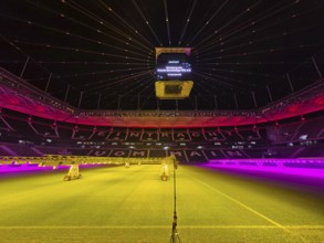 The Frankfurt Waldstadion (Deutsche Bank Park) is illuminated in red to mark the founding of the