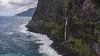 Waterfall flows into the sea, Miradouro do Véu da Noiva, Madeira, Portugal