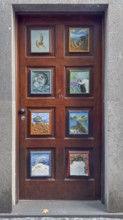 Colourfully painted doors on Santa Maria Street in the old town, Funchal, Madeira, Portugal