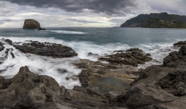 Rocky coast, volcanic rock formations, coast near Porto da Cruz, Madeira, Portugal