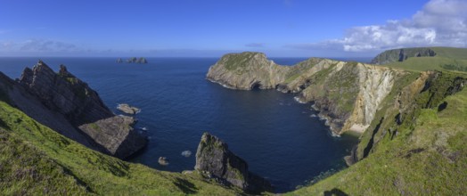 View of blue sea and cliffs with rock gate from Portacloy Loop Cliff Walk, Muingnabo, County Mayo,