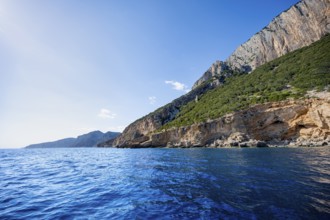 Picturesque rocky coast, cliffs and blue sea, Golfo di Orosei, Baunei, Sardinia, Italy