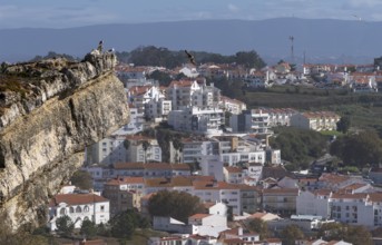 View from Leuct Tower towards orange tiled roofs in the town of Nazare, Estremadura, Portugal