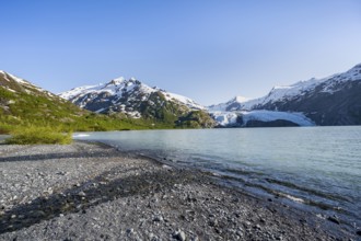 Snowy mountains and glaciers Portage Glacier on Portage Lake glacial lake, Chugach National Forest,