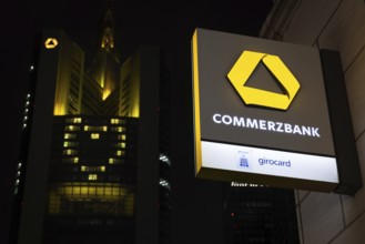 A yellow heart glows on the façade of the Commerzbank Tower in Frankfurt am Main at Christmas time