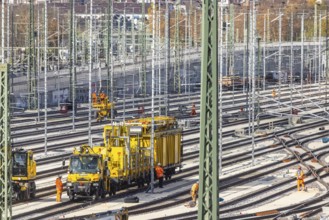 Rail construction crews with a work train. New parking station in Untertürkheim. As part of
