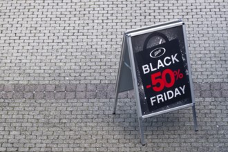 Symbolic photo advertising sign Chicoree Black Friday 50% discount, Lucerne, Switzerland