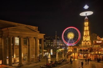Night view, Christmas market with Christmas pyramid, Ferris wheel, New Palace, Schlossplatz,