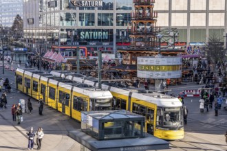 Trams at Alexanderplatz in Berlin, passers-by, Germany