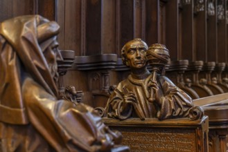 The choir stalls in Ulm Minster by Jörg Syrlin the Younger with impressive carvings. interior view.