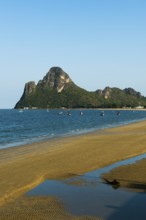 Lonely sandy beach and mountains, sunset, Prachuap Khiri Khan, Prachuap Khiri Khan Province,