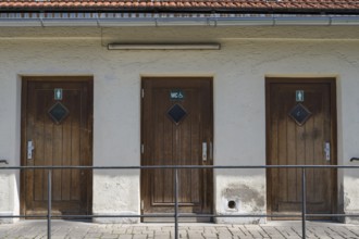 Building with doors to toilets, Schliersee, Upper Bavaria, Bavaria, Germany