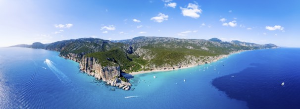 Picturesque rocky coast, cliffs and Cala Luna beach, aerial view, Golfo di Orosei, Baunei,