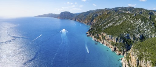 Picturesque rocky coast, cliffs and blue sea, aerial view, Golfo di Orosei, Baunei, Sardinia, Italy
