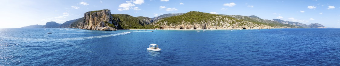 Panorama, picturesque rocky coast, cliffs and Cala Luna beach, aerial view, Golfo di Orosei,