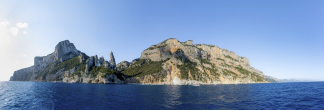 Panorama, picturesque rocky coast, cliffs with caves in the morning light, L'Aguglia rock peak,