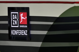 Moderation table, DAZN, Logo Bundesliga conference, conference call, Allianz Arena, Munich,