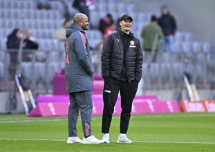 Coach coach Vincent Kompany FC Bayern Munich FCB talking to coach coach Alexander Blessin FC St.