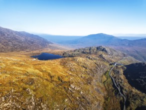 Autumn colours over Llyn Cwmffynnon and Miner's Track, Start Point, road A4086 from a drone,