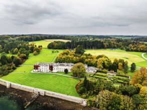 Autumn over Plas Newydd House from a drone, Gardens and Parkland, Llanfairpwllgwyngyll, Anglesey,
