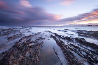 A riot of colors on North Head Beach on the east coast of Australia. Sunset over Rhettman Point