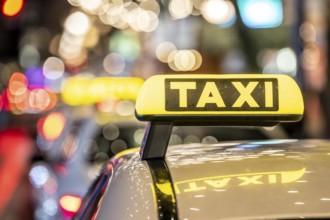 Taxi stop, on Tauentzienstraße in Berlin, in the evening, Germany