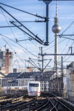 Railway line in Berlin, east of Friedrichstraße station, looking east, Berlin TV tower, ICE train