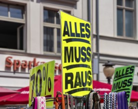 Retail trade with signs for price reductions and discounts, Potsdam, Brandenburg, Germany