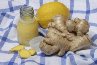 Ginger root, lemon and ginger shot