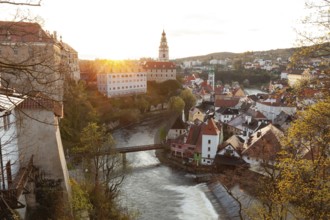 Spring morning sunrise with castle view over the rooftops of Krumlov in southern Bohemia, Czech