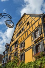 Decorated timber-frame house in the historic old town of Riquewihr, Ellsass