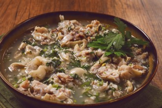 Muzhuzhi, a Georgian dish made from pork legs, with spices and herbs, homemade