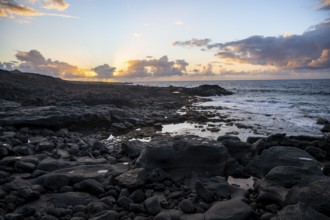 Seaside coast with volcanic rocks at sunset, La Santa, Lanzarote, Canary Islands, Spain