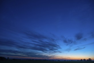 Landscape silhötte in the blue red evening sky, Mecklenburg-Western Pomerania, Germany