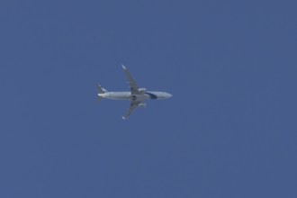 Boeing 737 jet passenger aircraft of El Al Israel airlines flying in a blue sky, England, United
