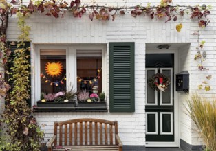 Decorated house façade for the traditional Martin procession in Tiefstraße, Altstadt, Kempen, Lower