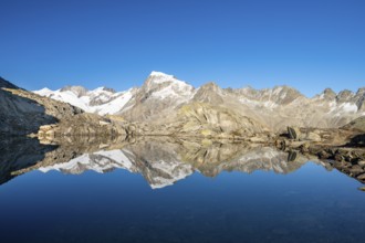 Mount Galenstock is reflected in Bergsee, Grätlisee, Canton of Valais, Switzerland