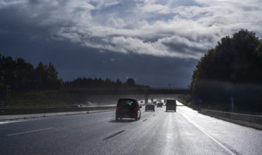 Cars on rain-wet A9 motorway during a thunderstorm, Hof, Upper Franconia, Bavaria, Germany