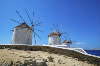 Mykonos, Cyclades, Greece - The six sixteenth-century windmills, lined up on a hill above Mykonos