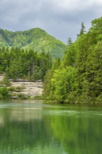 Landscape of Lake Elisabethsee on a rainy day in spring, Austria