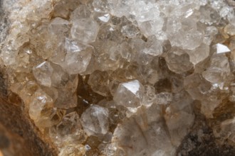 Vibrating quartz crystals mix with rock formations and capture light in a natural spring atmosphere