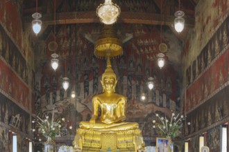Golden Buddha statue with Bhumispara mudra, Buddha Gautama at the moment of enlightenment,