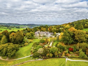 Autumn colours over Bodnant House and Garden from a drone, Conwy River, Colwyn Bay, Conwy, Wales,