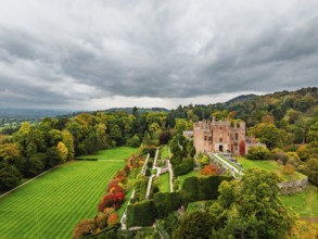 Autumn colours over Powis Castle and Garden from drone, Welshpool, Powys, Wales, England, United