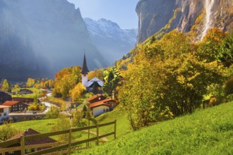 View of town and valley with Staubbach waterfall in autumn, Lauterbrunnen, Bernese Oberland, Canton