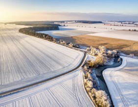 Bird Eye Perspective of Frost Covered Farmland. Seasonal Agricultural Scenery, winter and autumn
