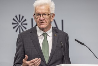 Winfried Kretschmann (Greens), Minister-President of Baden-Württemberg. portrait at the lectern