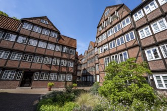 Facades of the historic brick buildings, inner courtyard, view over the city, Peterstraße,
